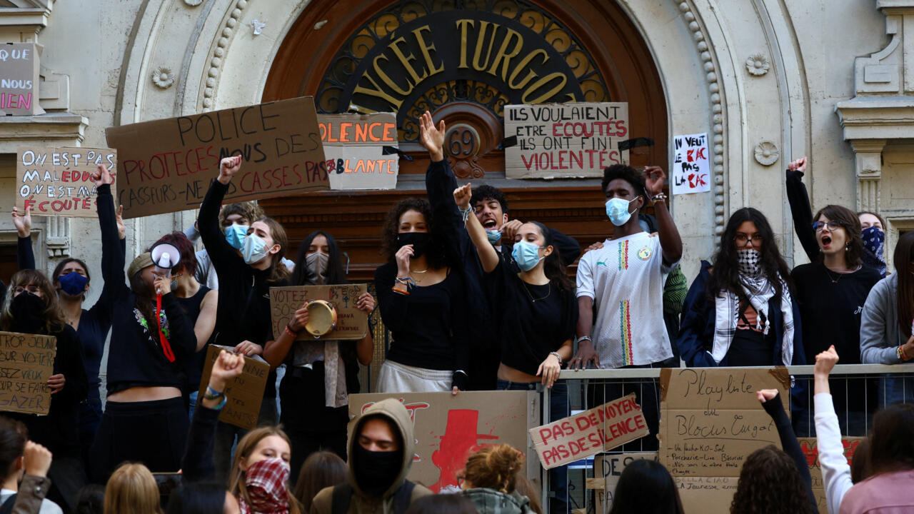 France suspends stun grenades after teenager loses hand in student protests