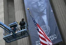 Banner Bearing Donald Trump’s Name Unveiled Outside US Justice Department