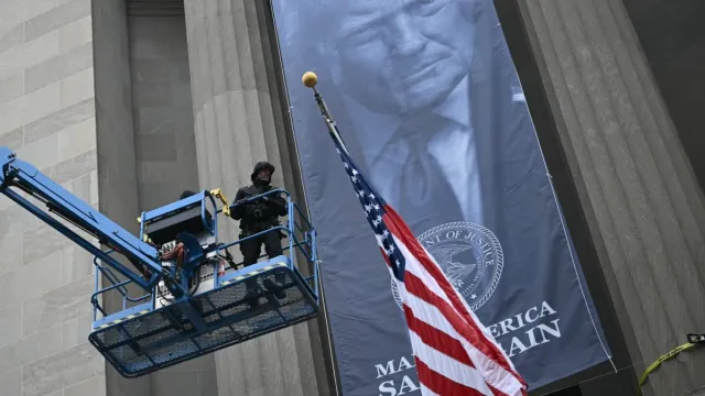 Banner Bearing Donald Trump’s Name Unveiled Outside US Justice Department