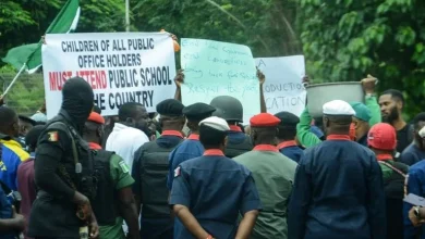 Security operatives disperse protesters in Abuja, arrest three