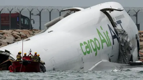 Two Dead After Cargo Plane Skids Off Hong Kong Runway and Crashes Into Sea